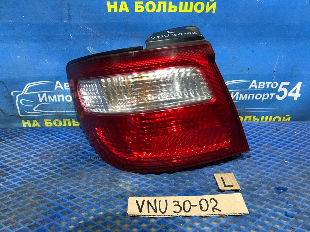 Стоп левый NISSAN PRESAGE 1998