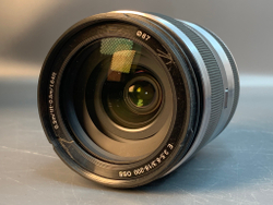 Sony 18-200mm OSS , сколы на пластмассе передней линзы
