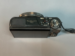 Canon PowerShot G7X Mark II немного пыли внутри объектива