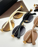 Солнцезащитные очки Bvlgari