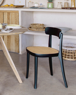 Стул Romane из массива бука черного цвета с ясеневым шпоном и ротангом