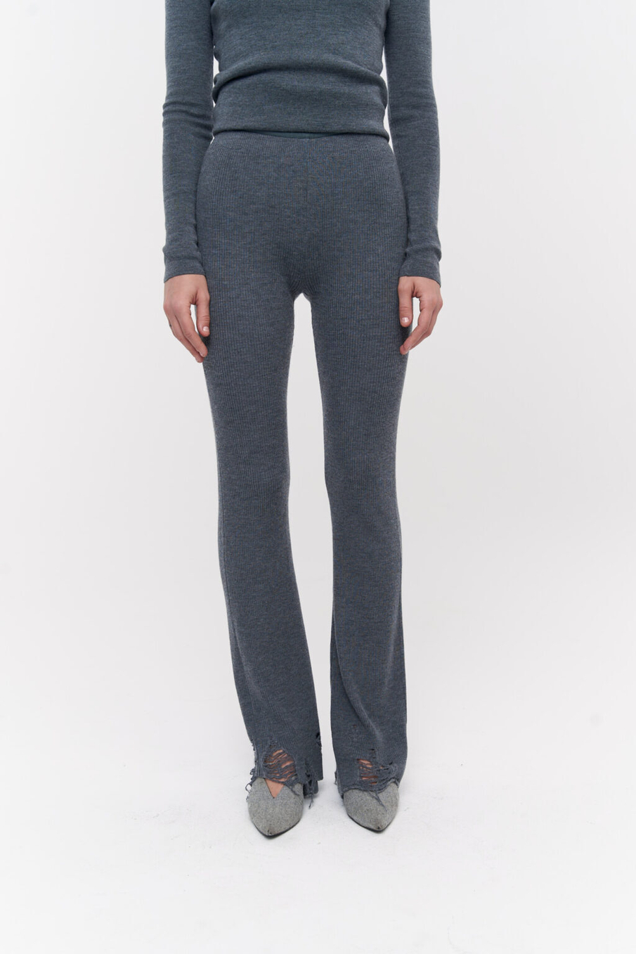 Брюки с рваным краем