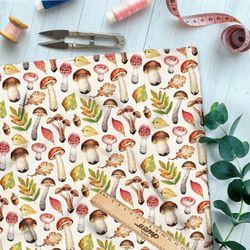 Ткань габардин лесные грибы и желтеющие листья на белом фоне