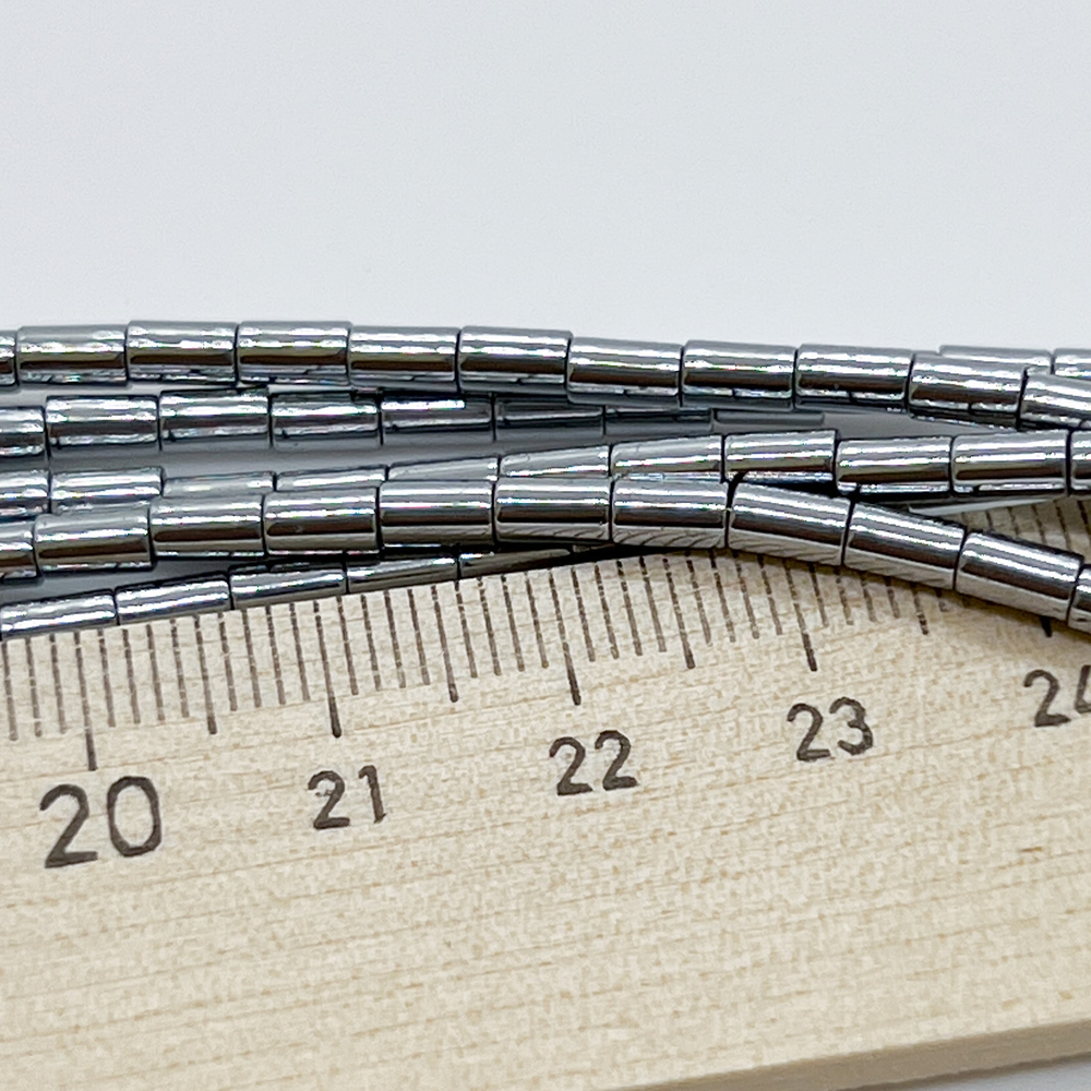 Гематит (имитация), цвет серебристый, размер около 5,1*2,8 мм, цена за 37-38 шт (1/2 нити)