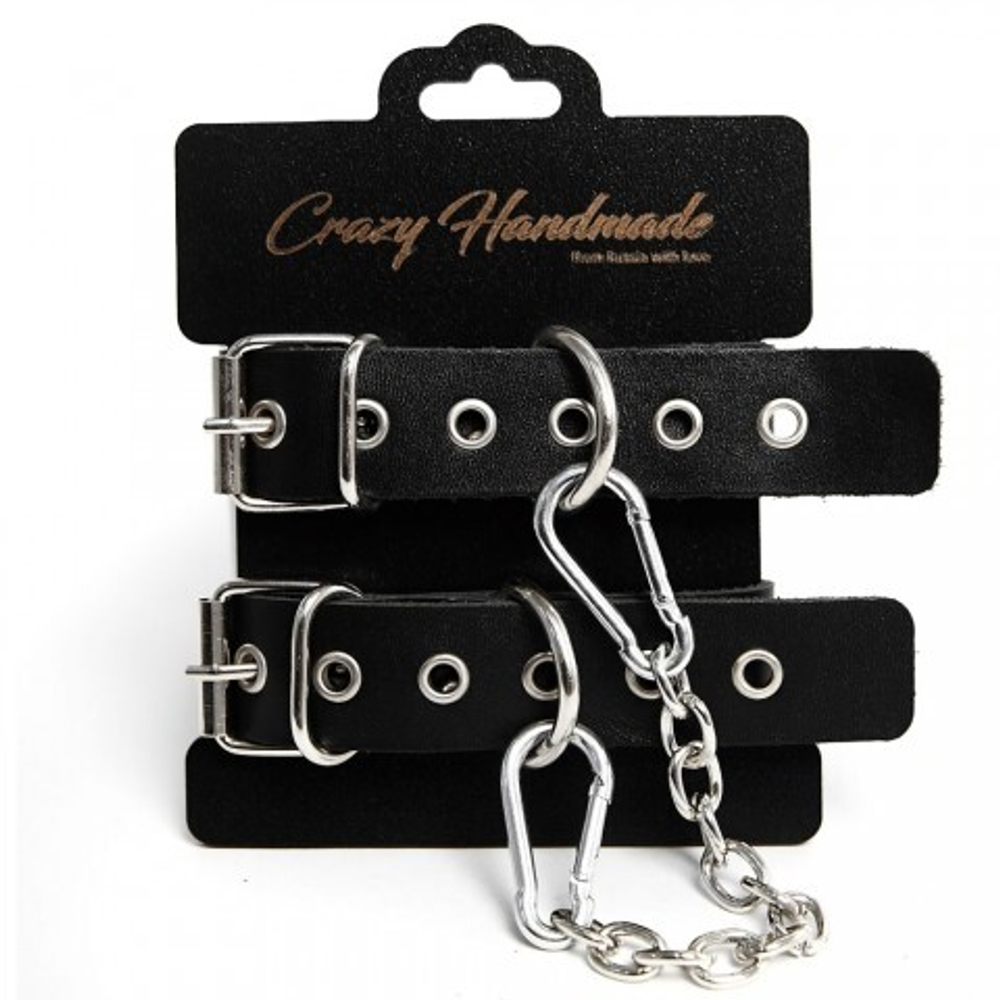 Наручники однослойные, прямоугольной формы, чёрного цвета