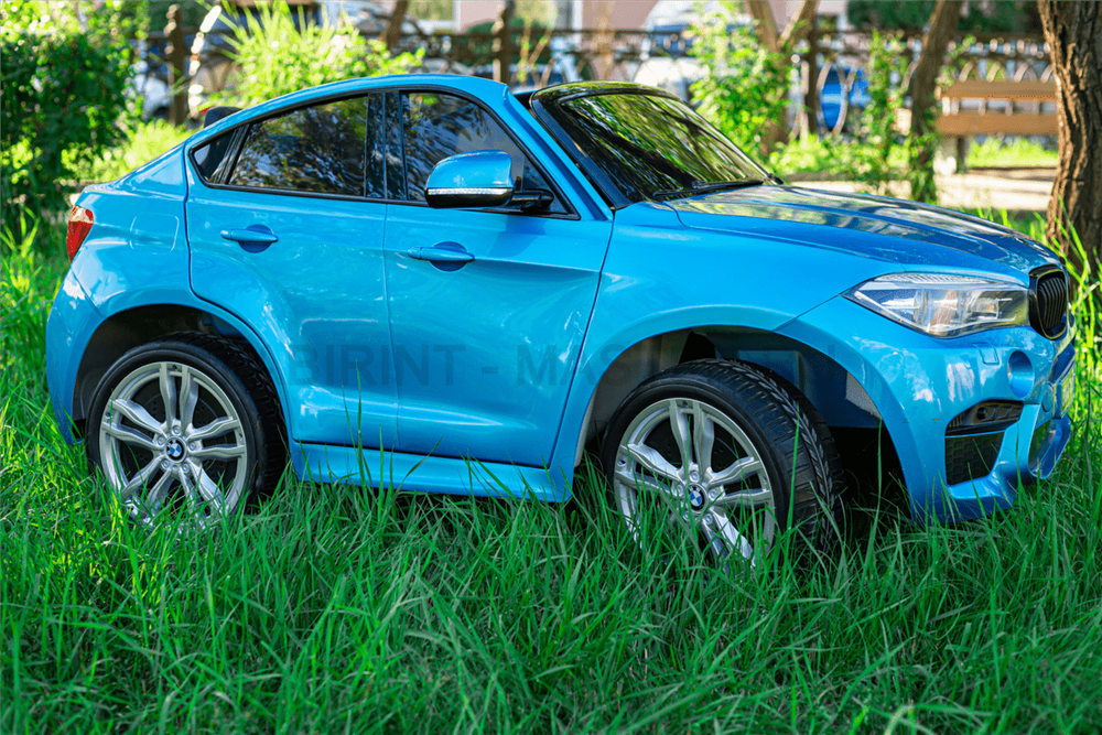 Детский двухместный электромобиль "BMW X6M" JJ2199 12V