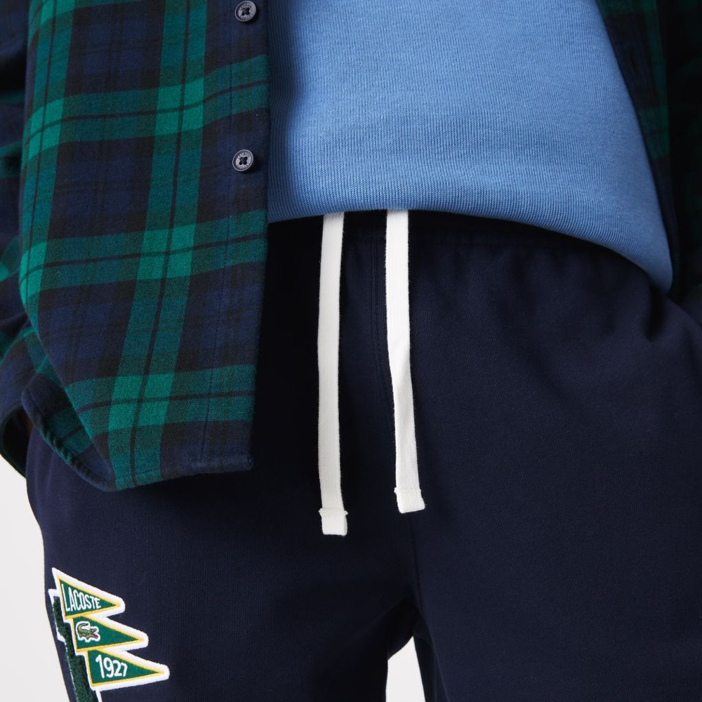 Мужские штаны теннисные Lacoste Men's Pennants L Badge Fleece Tracksuit Pants - navy blue