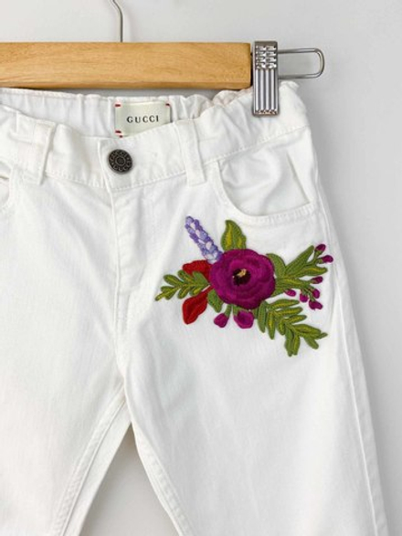 Джинсы Gucci, 116