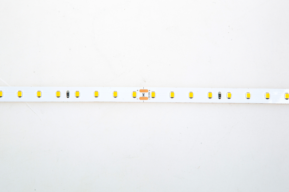 Лента светодиодная SMD тёпло-белая DC24V 12W/m 3000K 1842Lm/m 80д/м CRI>85 IP20,  упаковка 5 метров,  ширина 10мм,  высота 2мм,  самоклейкая