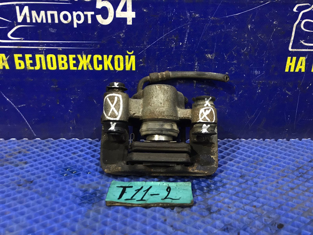 Суппорт тормозной задний левый CHERY TIGGO 2006