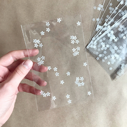 Прозрачный пакет 10х15 см (белые цветы), 100 шт