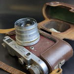 №13 Фотоаппарат "ФЭД-2" с объективом "Индустар - 62м" в оригинальном кофре с документом , металл, стекло, кожа, Харьковский машиностроительный завод им. Дзержинского (ФЭД), СССР, 1961-1979 гг.