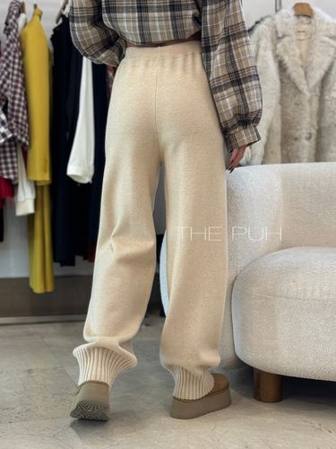 Бежевые трикотажные брюки