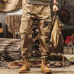 Брюки для мужчин свободные с накладными карманами и резинками внизу брючины от бренда JIELEINUO