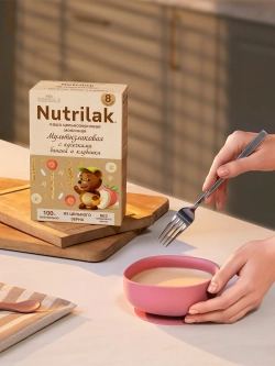 Каша молочная сухая Nutrilak Premium Procereals мультизлаковая с кусочками банана и клубники 200г