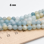 Аквамарин + берилл, диаметр около 6,3-6,5 мм, цена за 31-32 шт (1/2 нити)