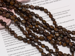Нить бусин из бронзита 6,5х9мм, галтовка
