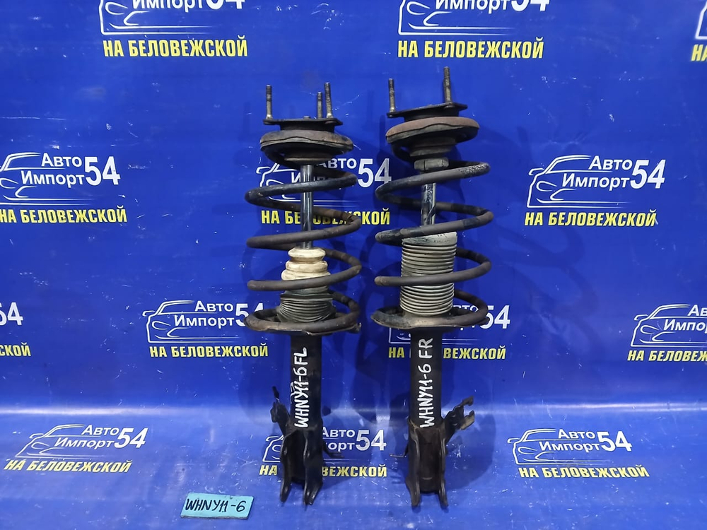 Стойка передняя правая NISSAN WINGROAD 1999