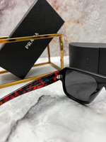 Солнечные очки Prada