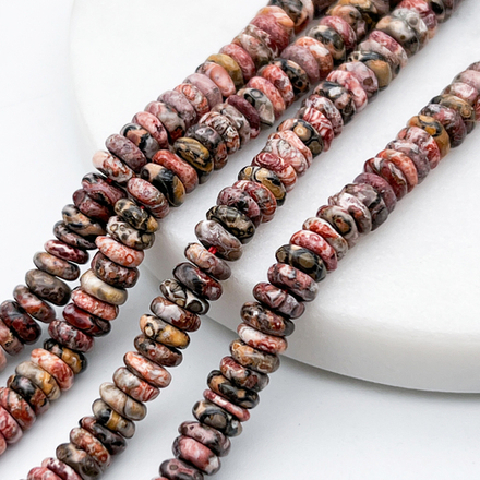 Риолит бусины, рондель, размер около 1,8-2,5*5,5-6 мм, цена за отрезок 19 см (1/2 нити)