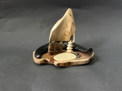 Мамонт у скалы