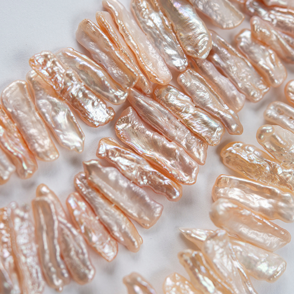 Жемчуг культивированный Бива, розово-персиковый, с боковым центральным отверстием, 18-30*6-9мм