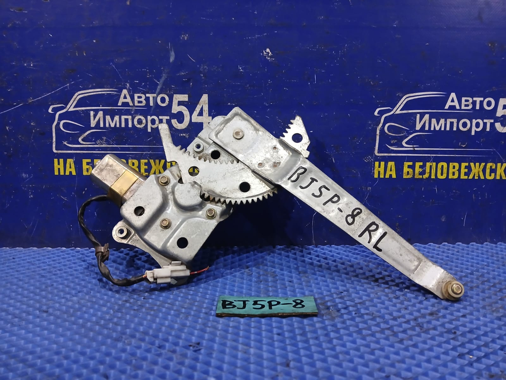 Стеклоподъемник задний левый MAZDA FAMILIA 2003