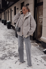 Пуховик средней длины из шерсти с капюшоном