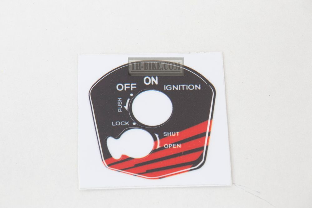 Sticker on ignition switch. Zoomer-X