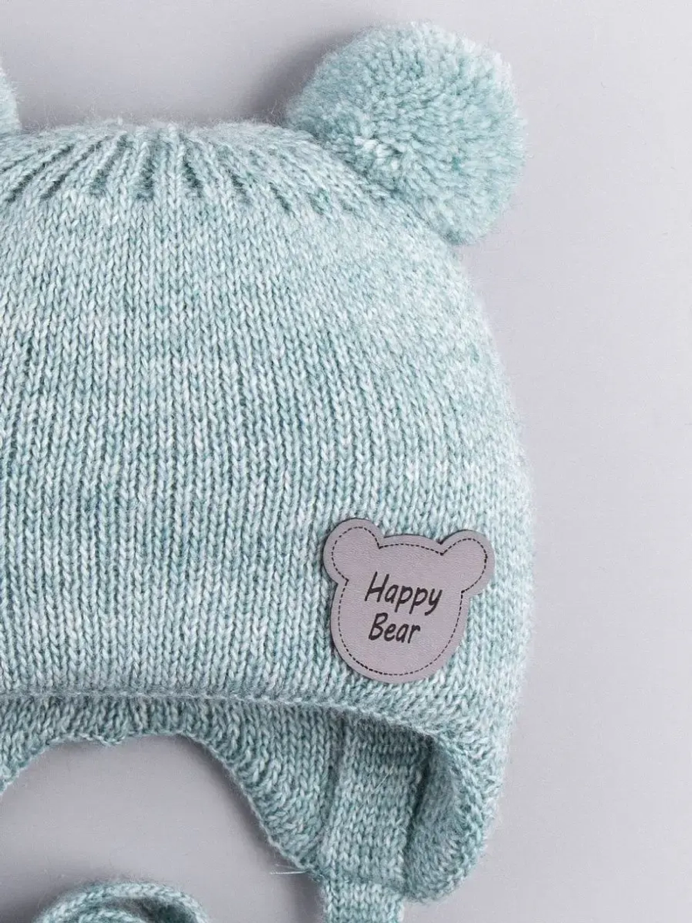 Шапка для мальчика осенняя с завязками и помпонами