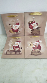 Пакет бумажный Дед Мороз 23*18*10см 4 вида микс