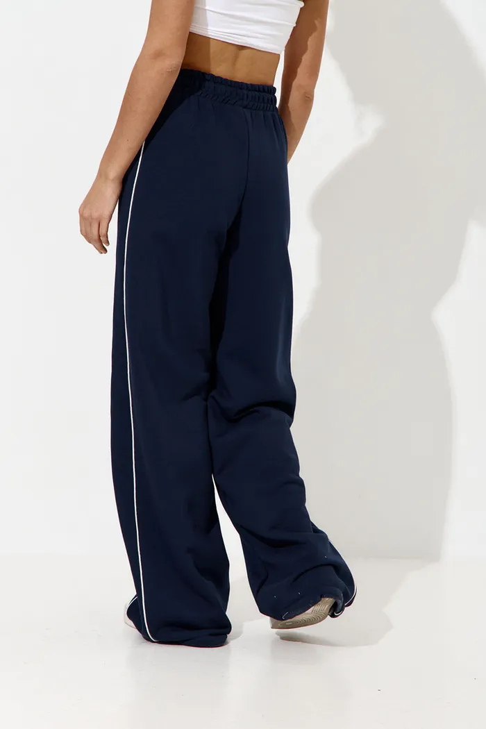 Широкие джоггеры без начеса с кантом цвета нейви