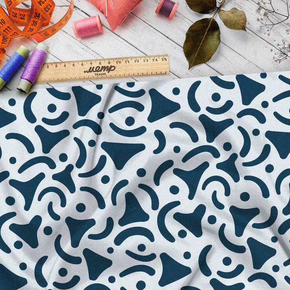 Ткань блэкаут синие треугольные узоры на голубом фоне