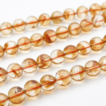 "Цитрин" бусины (кварц), диаметр около 8,4-8,6 мм, цена за 11 шт (1/4 нити)