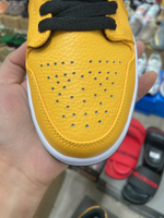 Jordan 1 Low University Gold