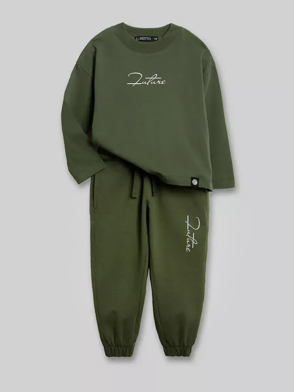 Зеленый костюм для мальчика в школу