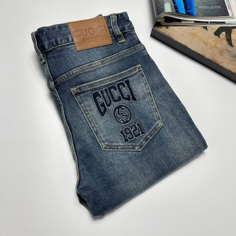 Джинсы Gucci