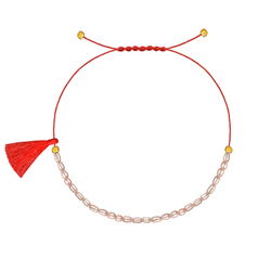 браслет из розового жемчуга с красной кистью на нити