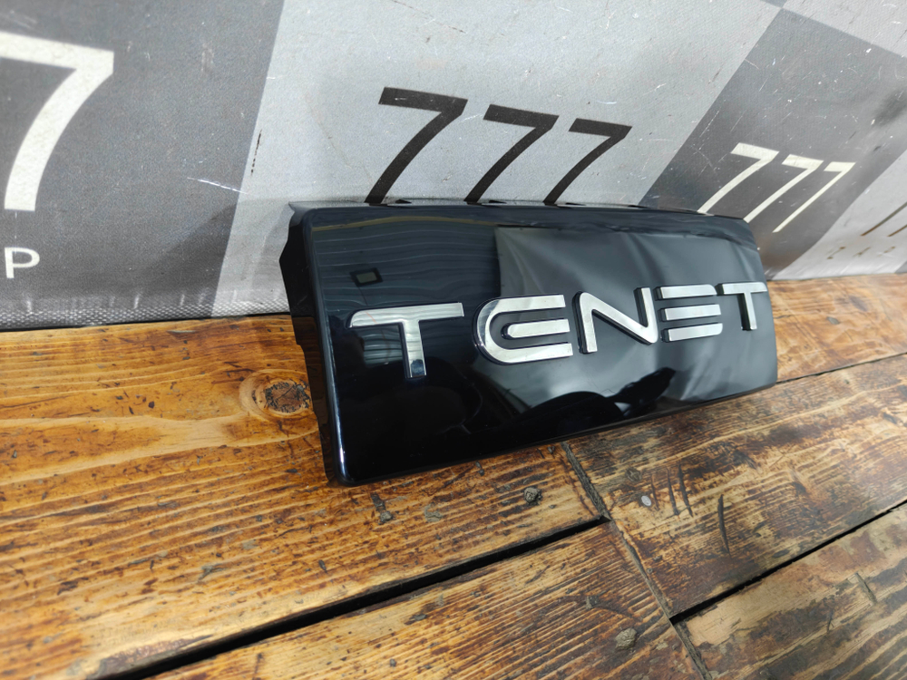 Эмблема передняя Tenet T7 25-нв Б/У Оригинал 602009914AA