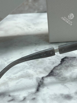 Солнечные очки Prada