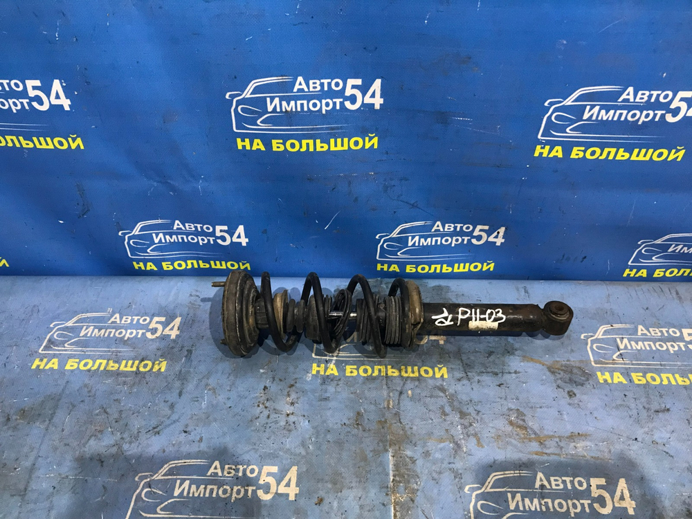 Стойка задняя левая NISSAN PRIMERA 1999