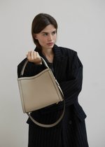 DORRIE mini жемчужная №3 - дефект кожи с торца сумки