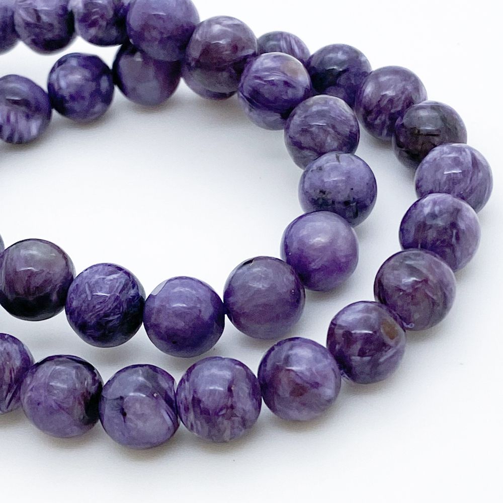 Чароит, диаметр 8-8,3 мм, цена за 11 шт (1/4 нити)