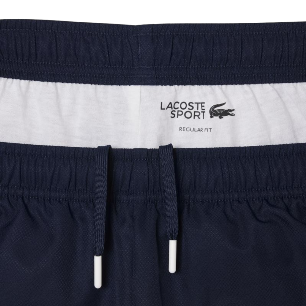 Мужские теннисные штаны Lacoste Tennis Printed - midnight blue
