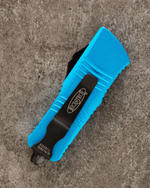 Автоматический складной нож Microtech Mini Troodon Black Tanto 240-1BL (голубой) фронталка/выкидуха
