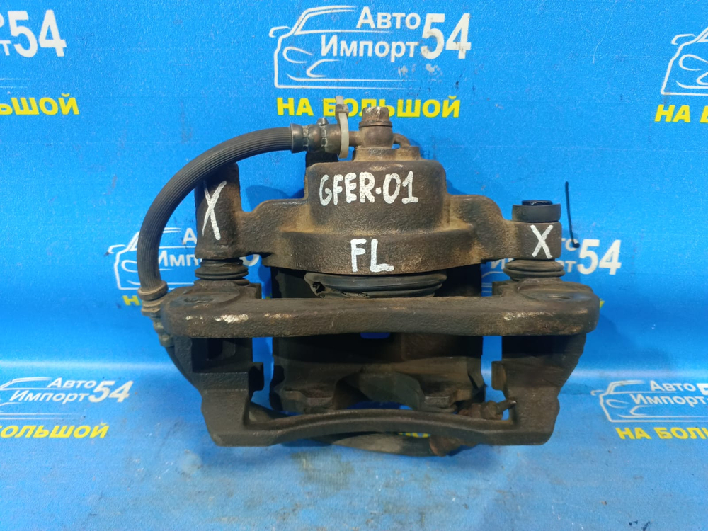 Суппорт тормозной передний левый MAZDA CAPELLA 1998