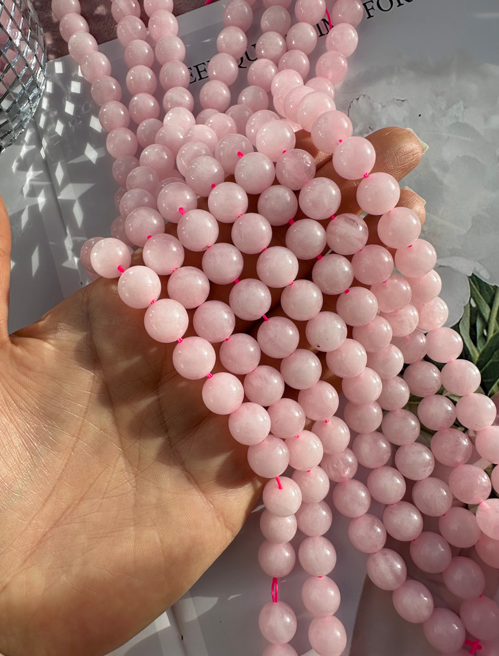 Нить бусин из розового кварца 10,4мм, гладкие