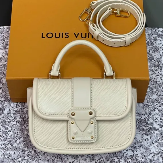 Сумка Louis Vuitton Hide And Seek кремовый