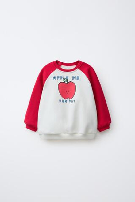ZARA ТОЛСТОВКА РЕГЛАН С ЯБЛОКОМ, ЭКРЮ/КРАСНЫЙ