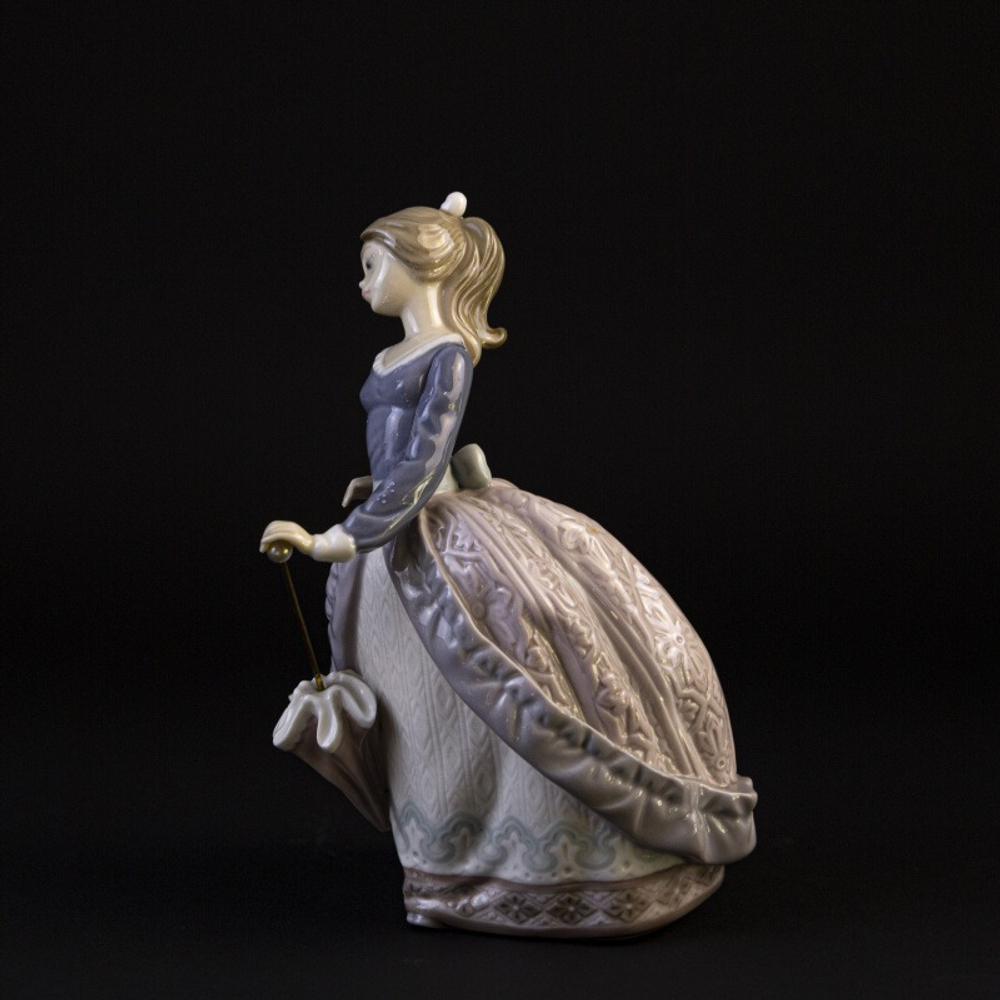 Фарфоровая мануфактура Lladro «Модница с зонтиком»